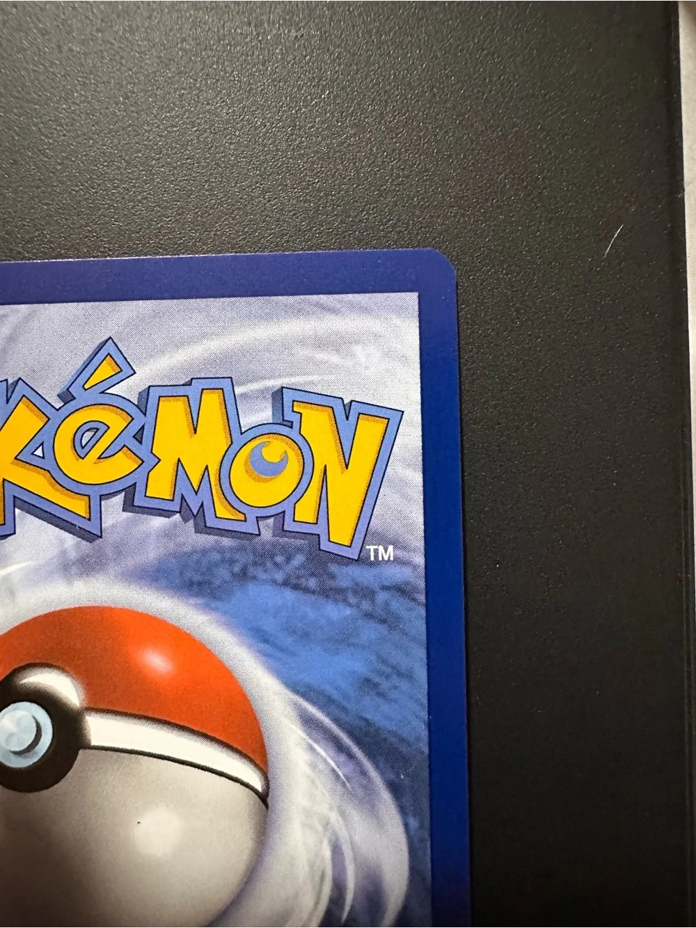 Pokemon card being